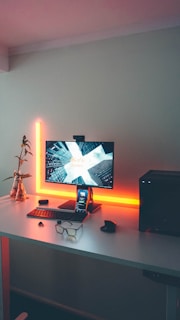 turned-on flat screen computer monitor