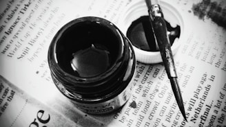 A close-up of eco-friendly inks used on a drawing board.