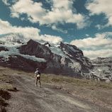 man walking on pathway