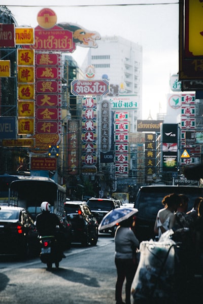 Bangkok Chinatown street signs in multiple languages at night