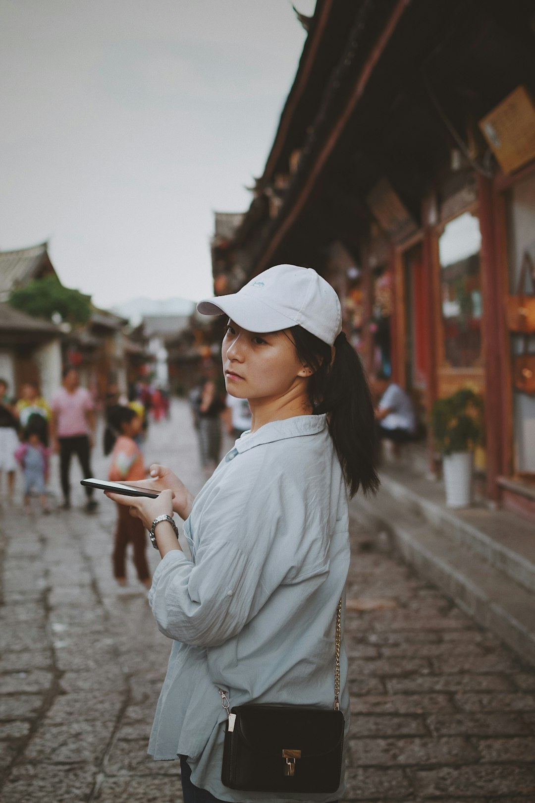 woman holding smartphone