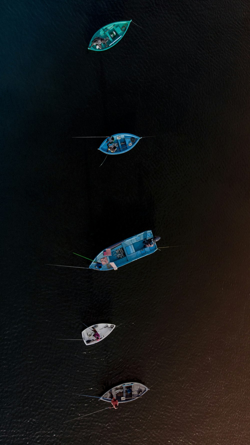five boats passing each other