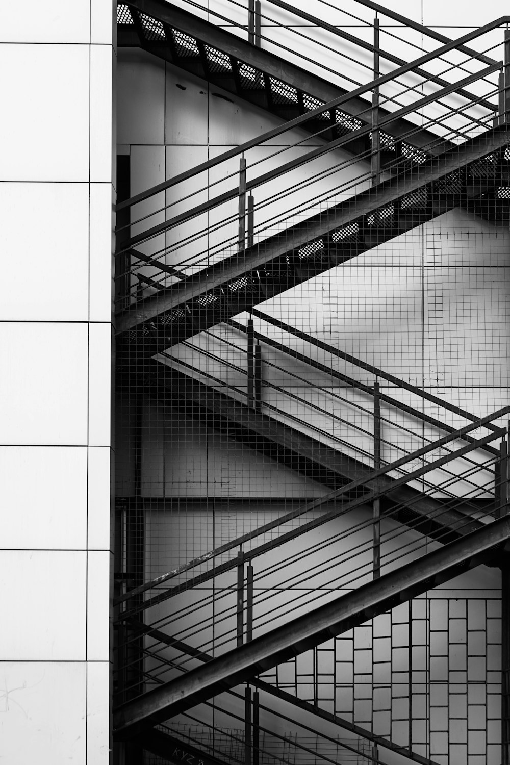 grayscale photography of stairs