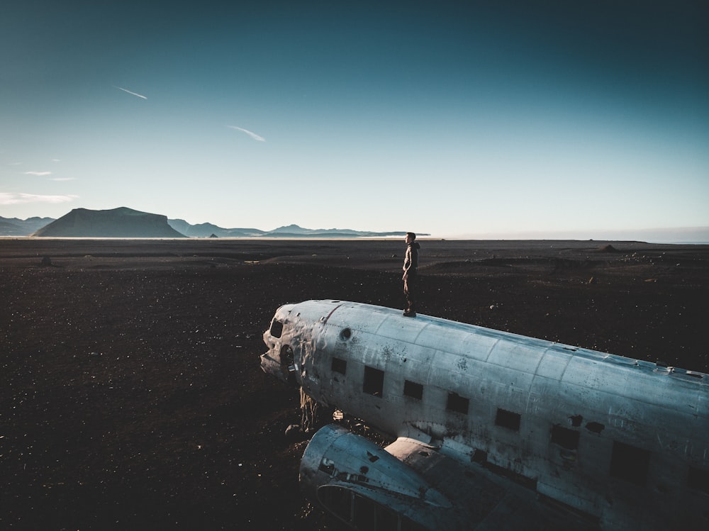 person standing on plane