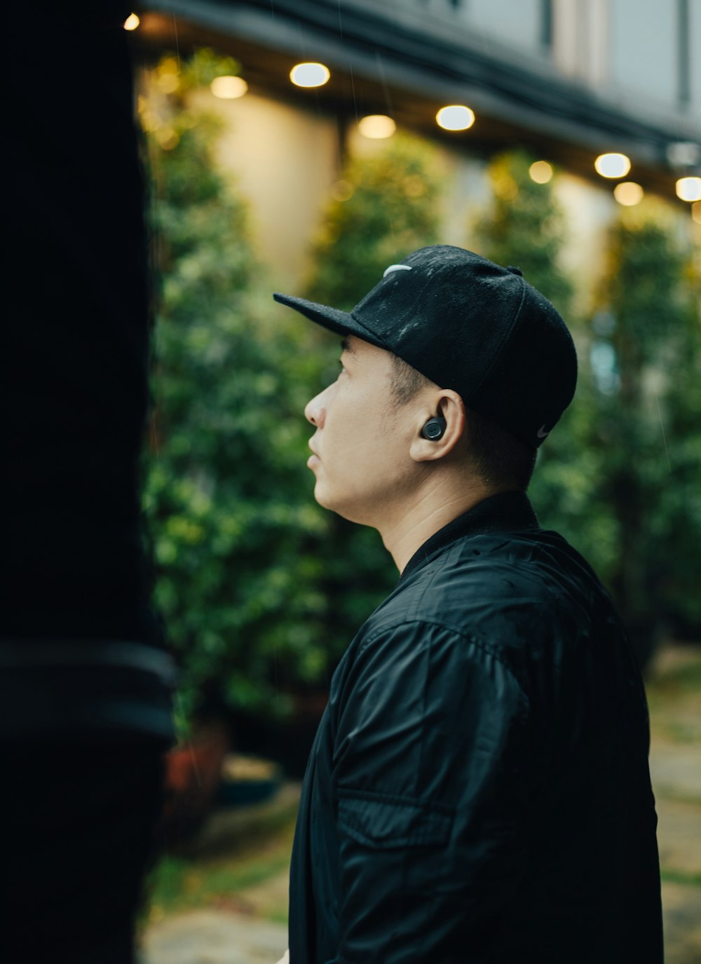 man wearing black fitted cap