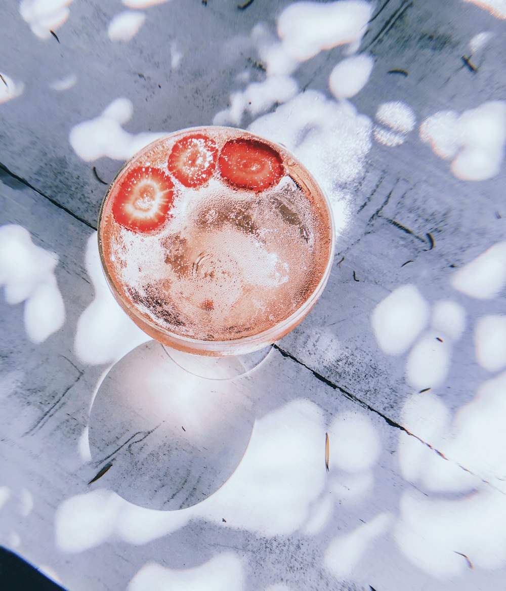 liquid with sliced strawberry