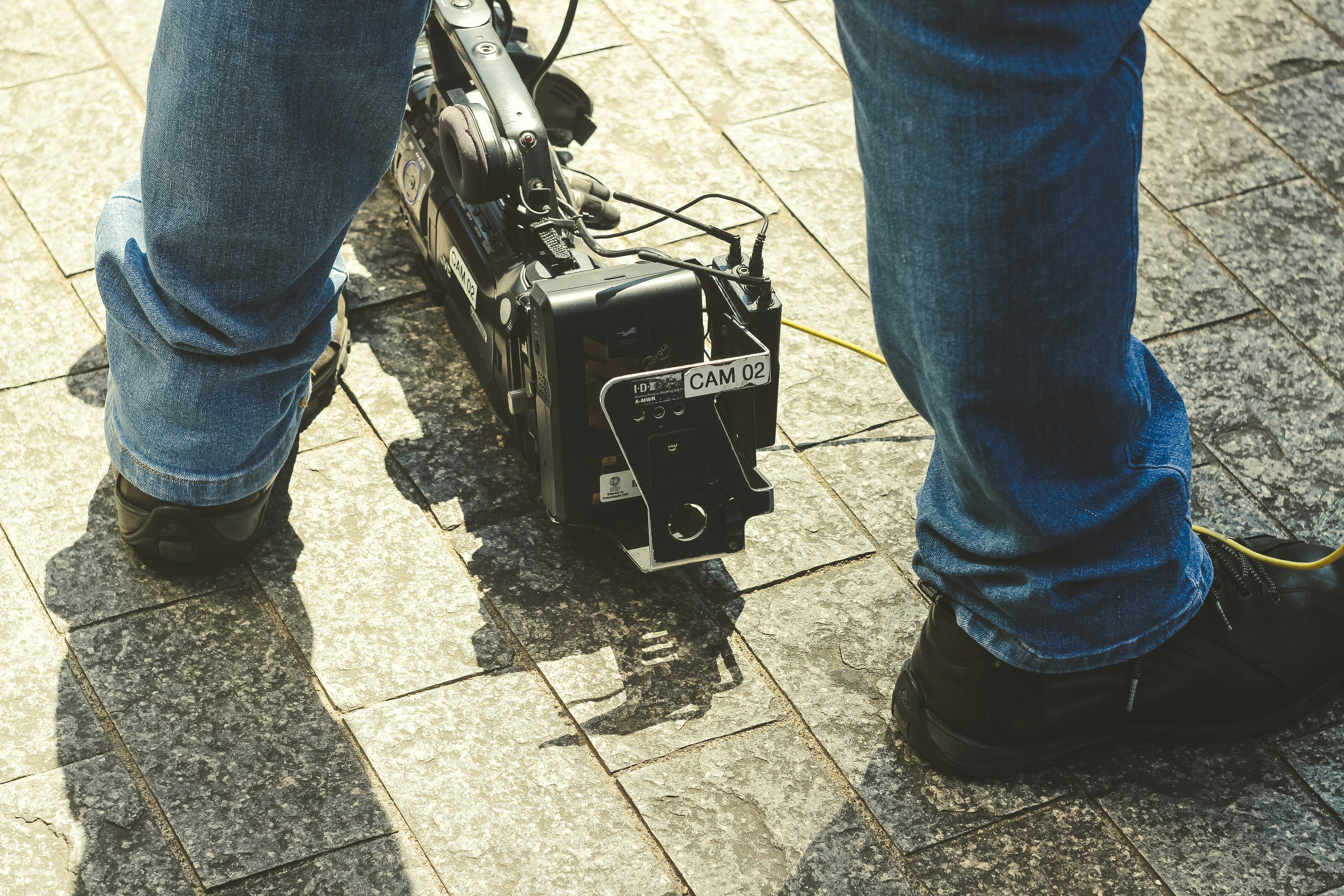 black camera stabilizer on ground