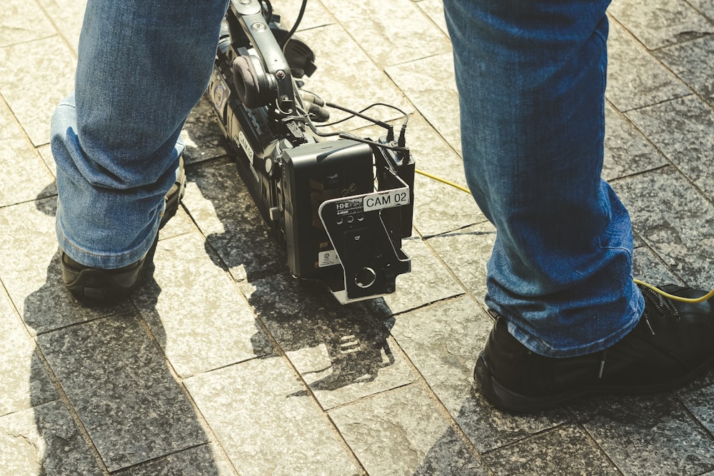 black camera stabilizer on ground