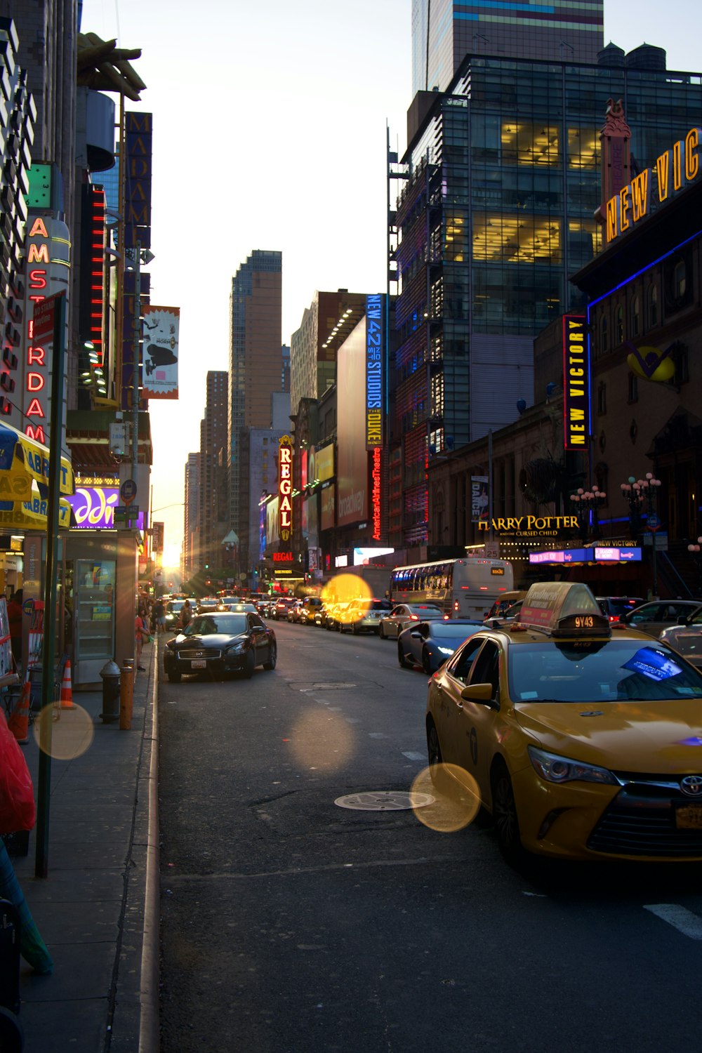 cars travelling on city street