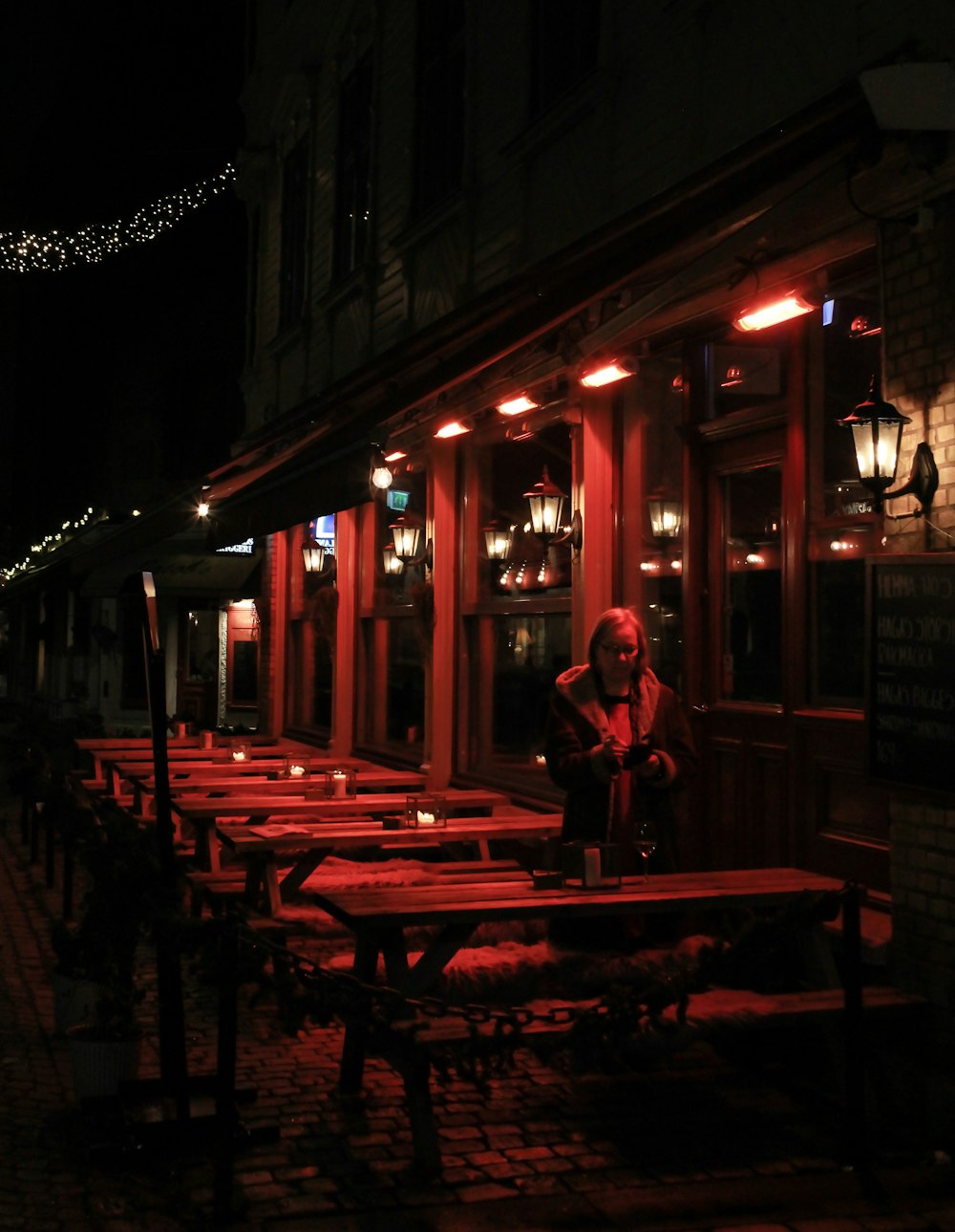 red tinged storefront