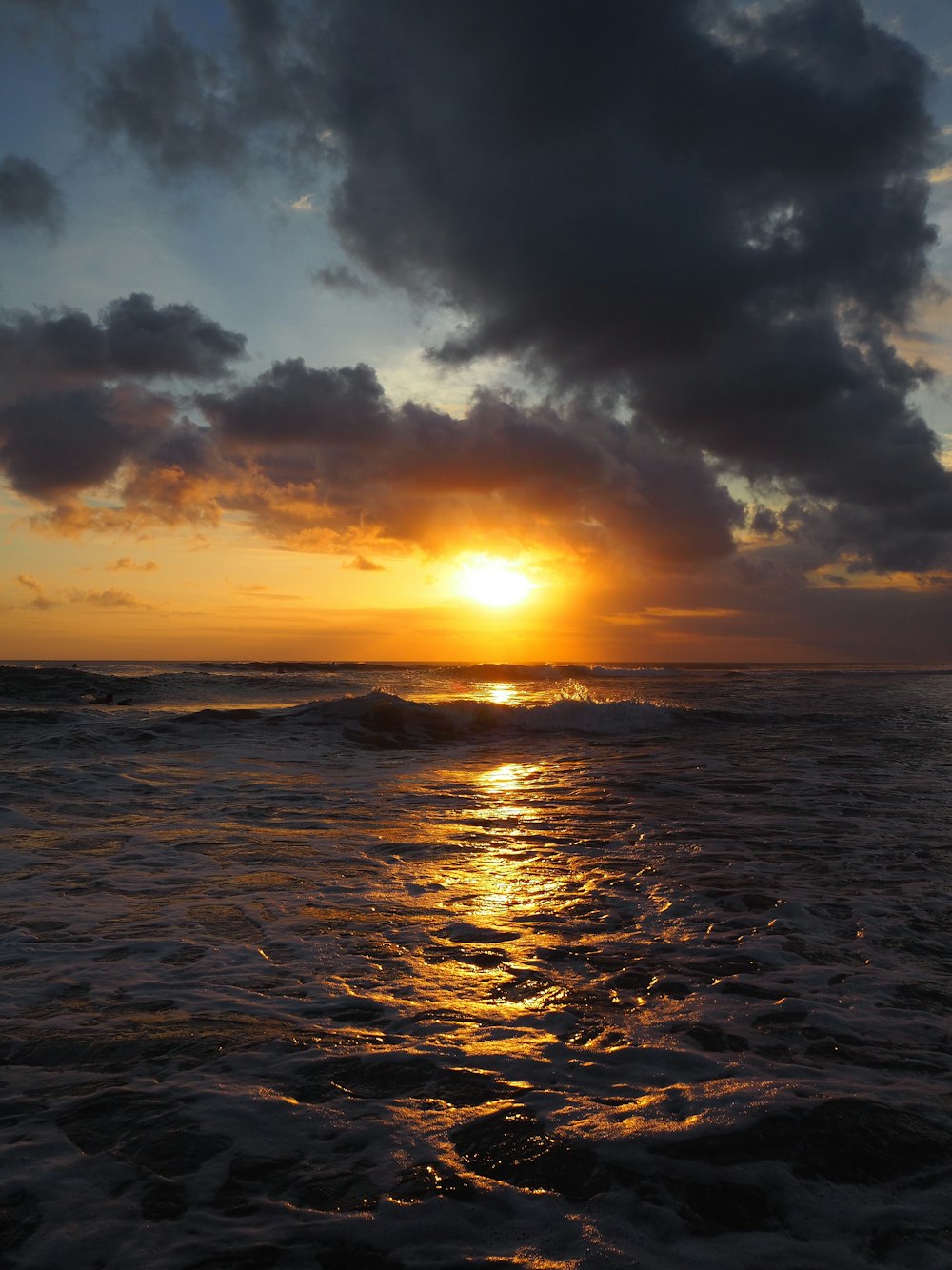 body of water under golden hour