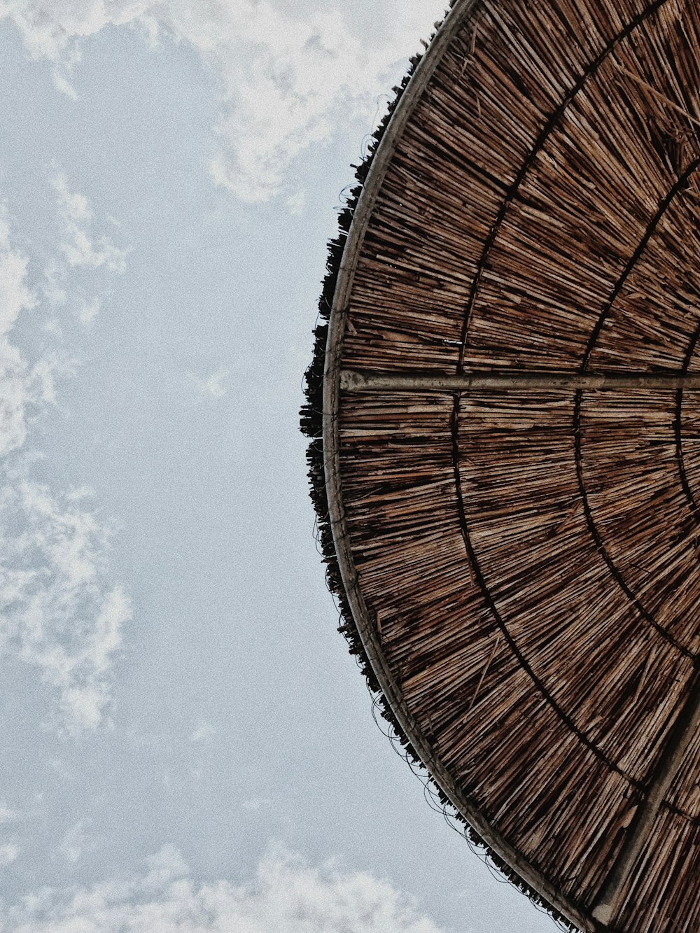 low-angle photography of brown roof