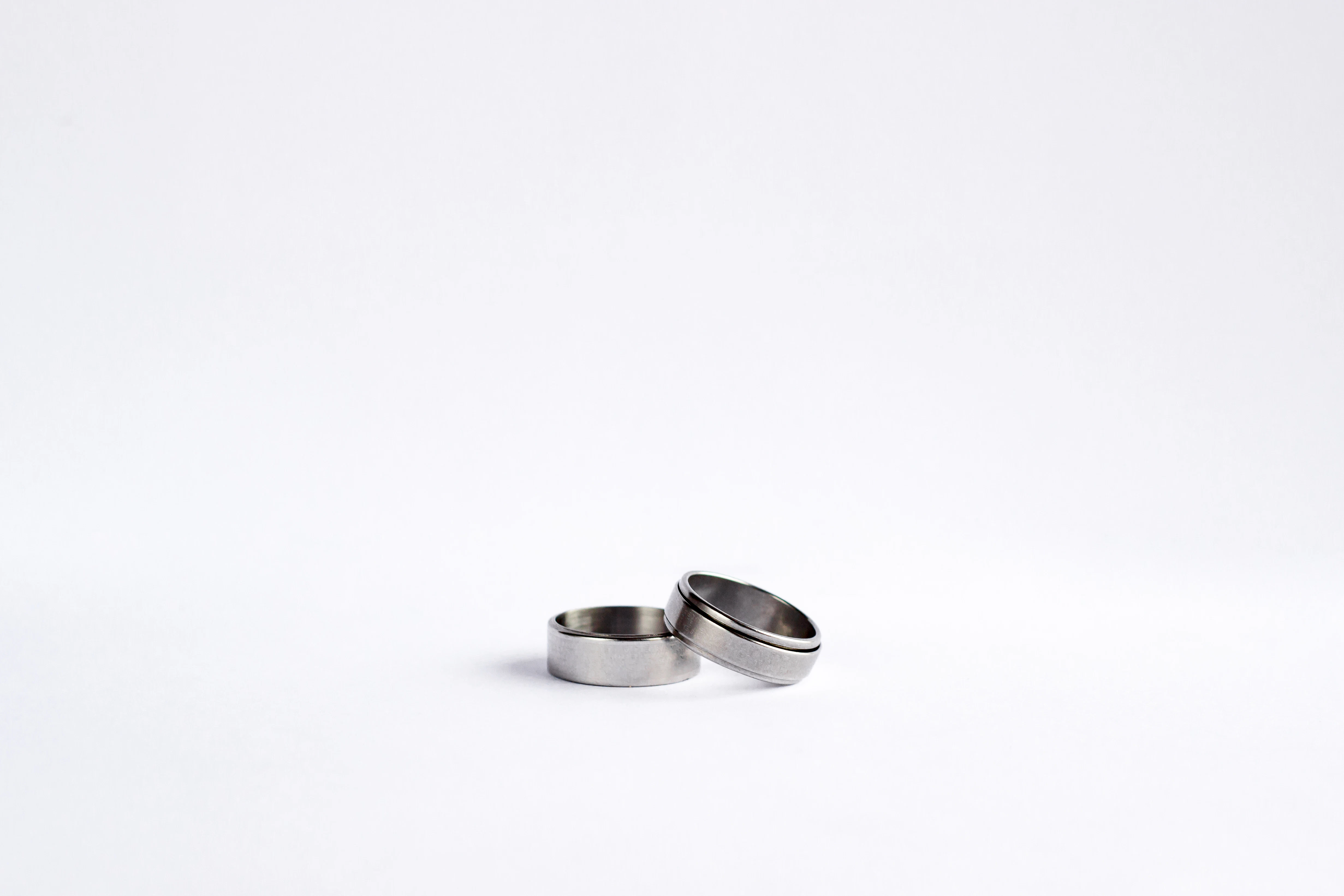 Modern brushed platinum and titanium mens wedding band