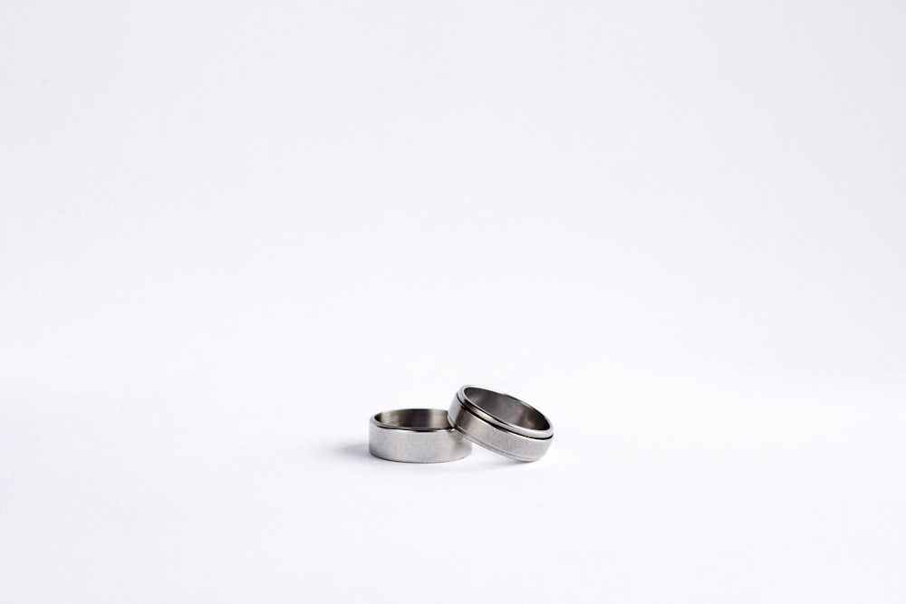 silver-colored ring