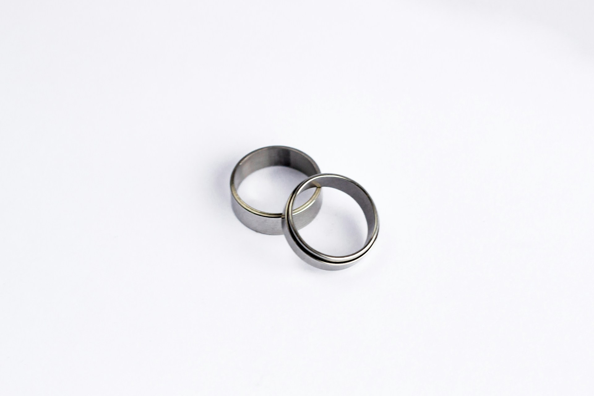 two silver ring band