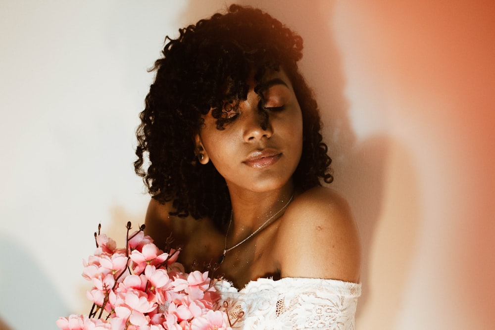 woman wearing in white floral lace dress