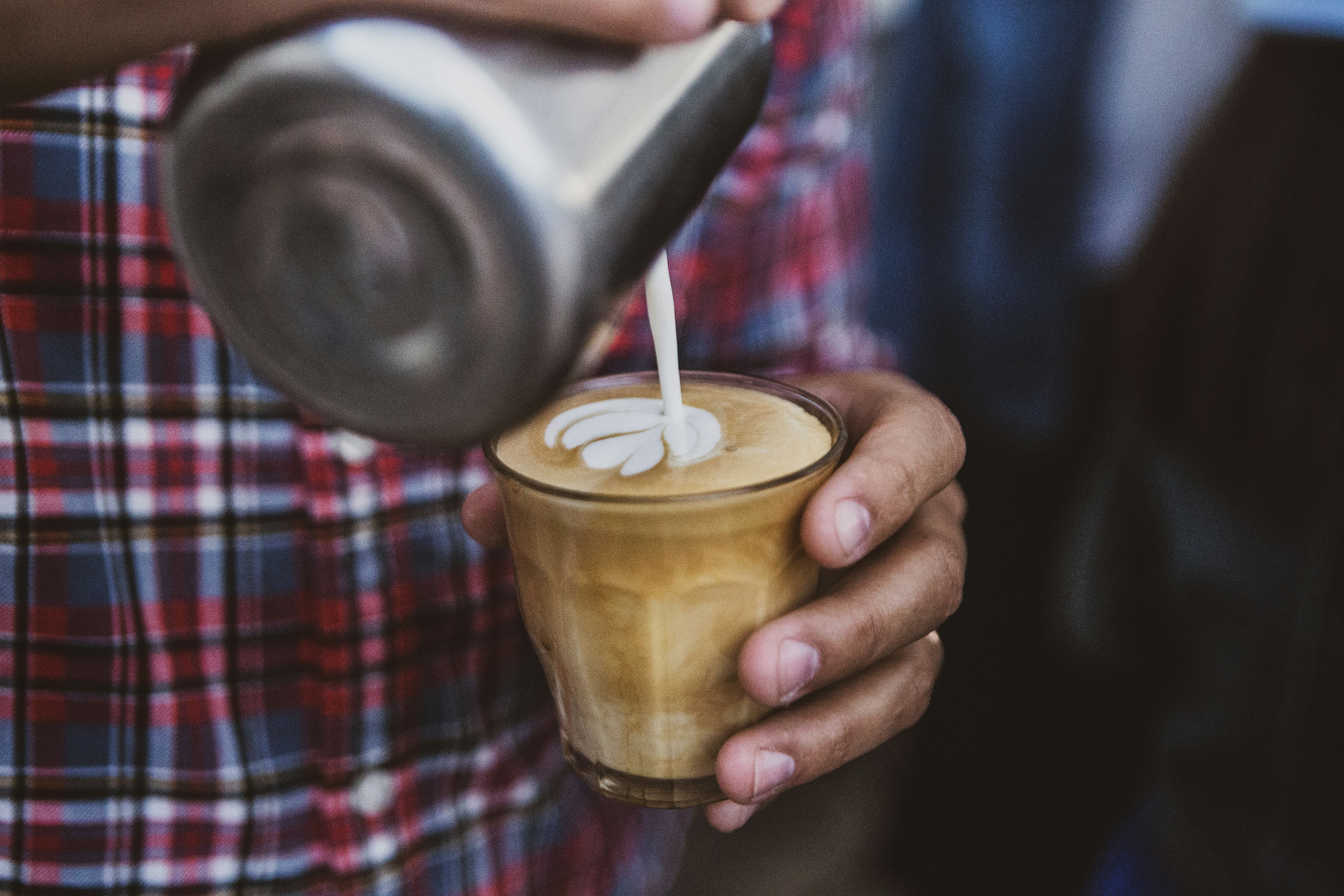 cafe latte in a clear glass cup