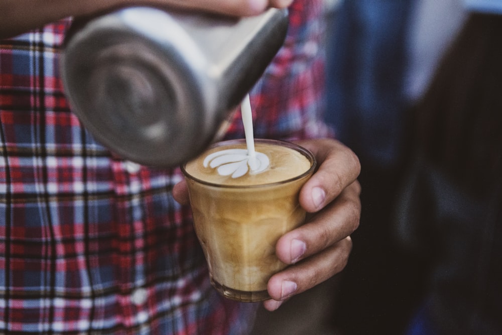 cafe latte in a clear glass cup