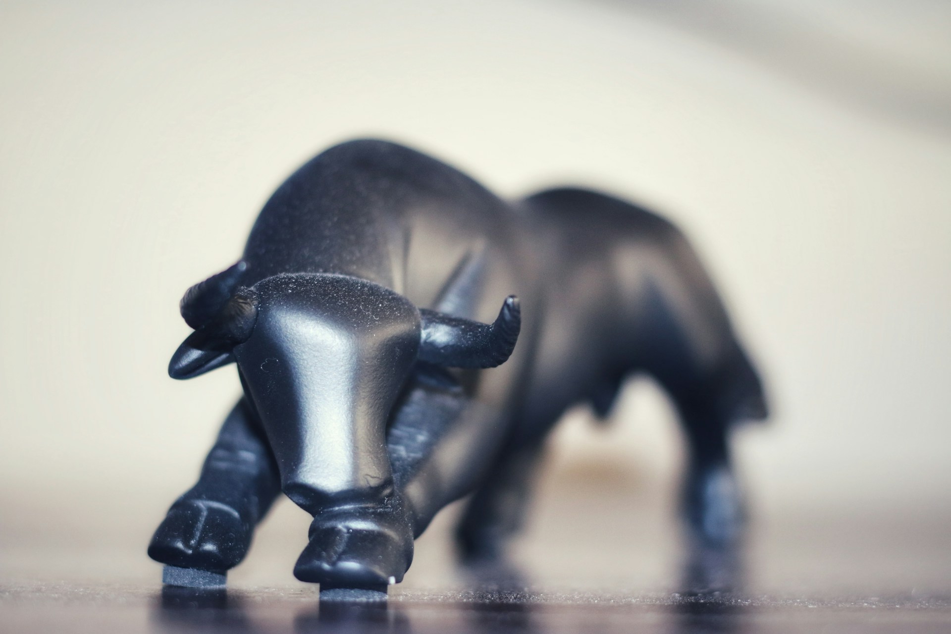 An abstract representation of a bull charging forward, symbolizing market momentum and trading success.