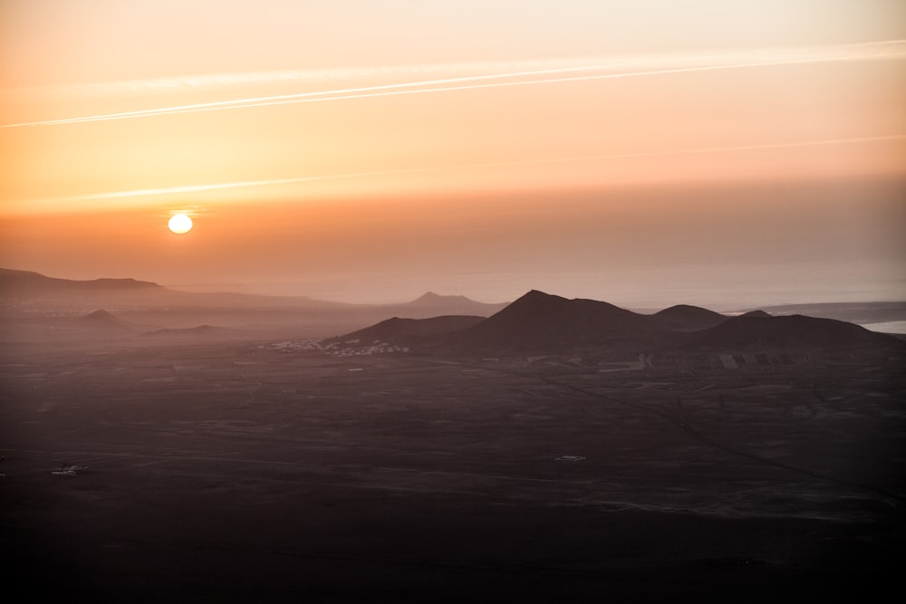 mountains under sunrise