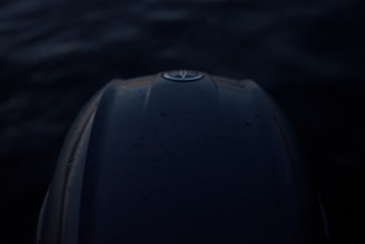 A dark-themed close-up of a confidential file stamped 'Top Secret,' flickering red accents hinting at hidden truths.