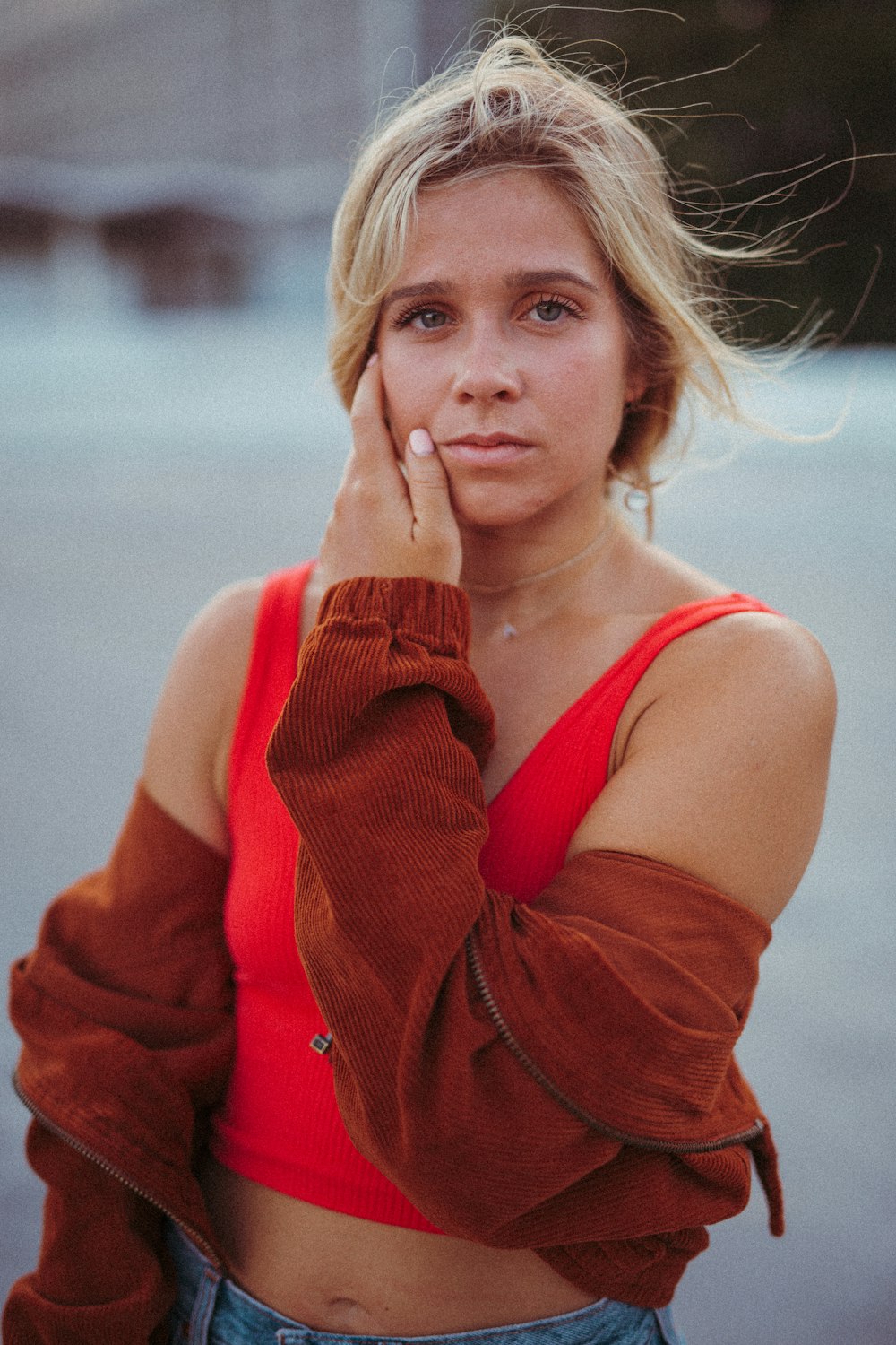 woman in red crop top