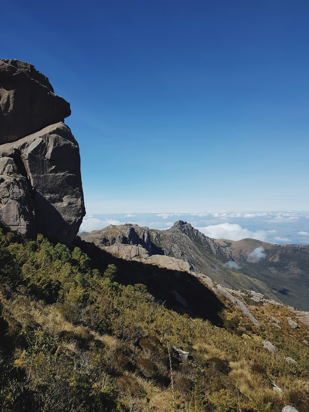 green covered mountain under blue sky