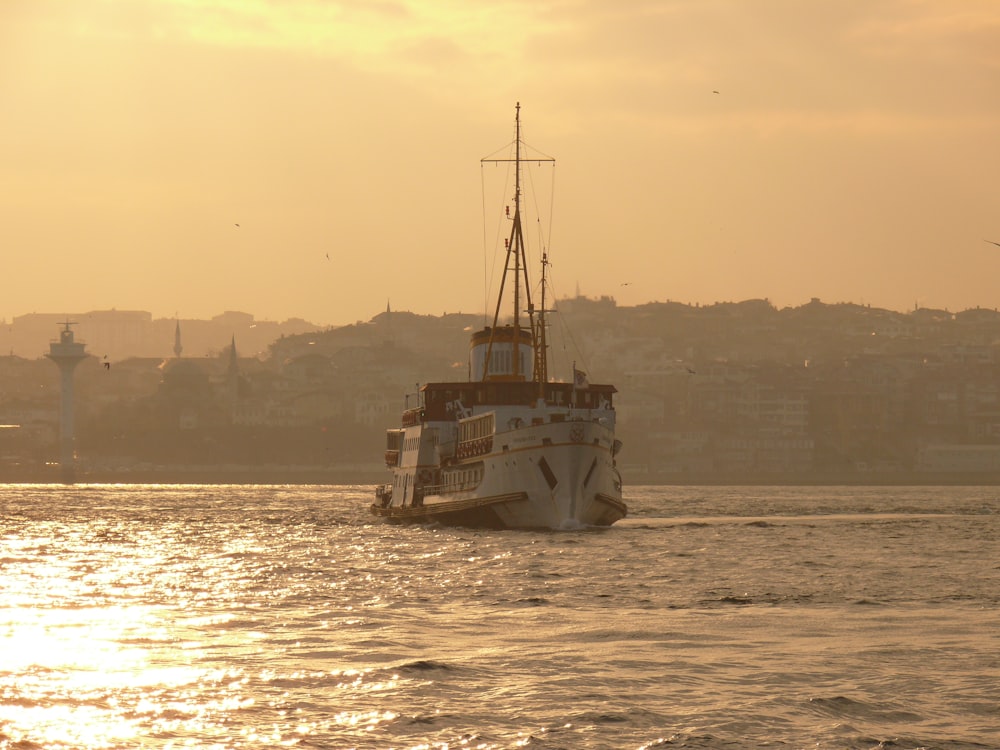 white cruiseship during golden hour