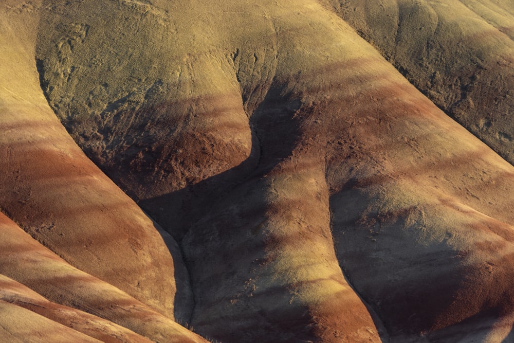 a group of hills that are covered in dirt