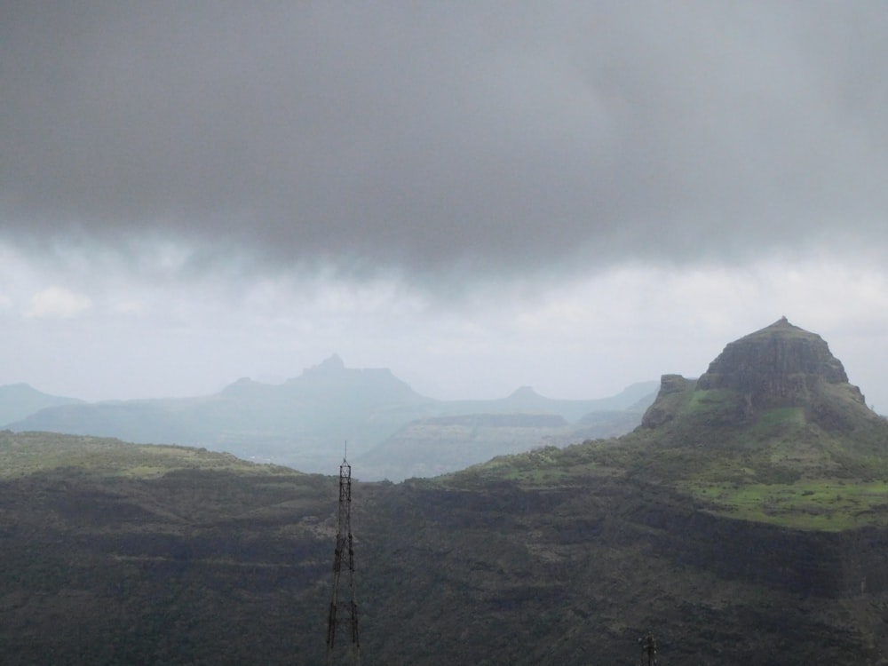 landscape photography of green mountain