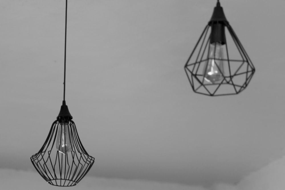 grayscale photography of pendant lamp