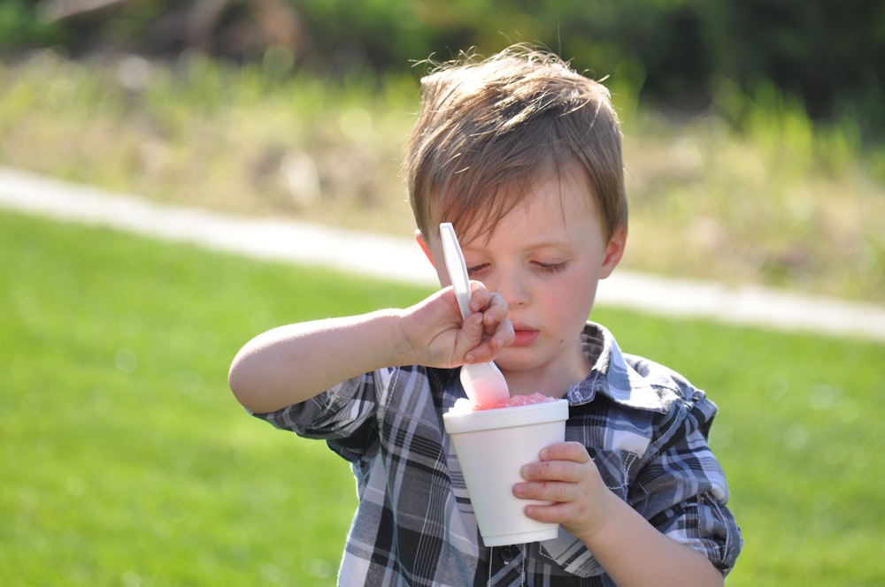 toddler eating ice cream outdoors