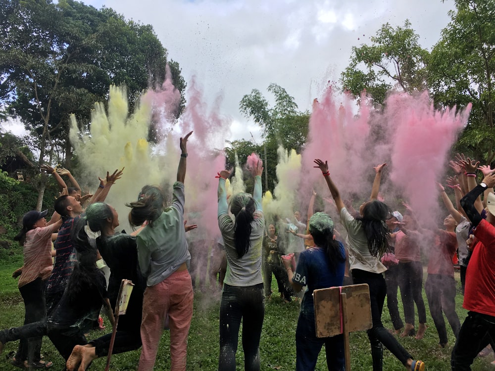 people playing color powder
