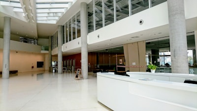 A team of professional facilities staff coordinating services in a modern office lobby