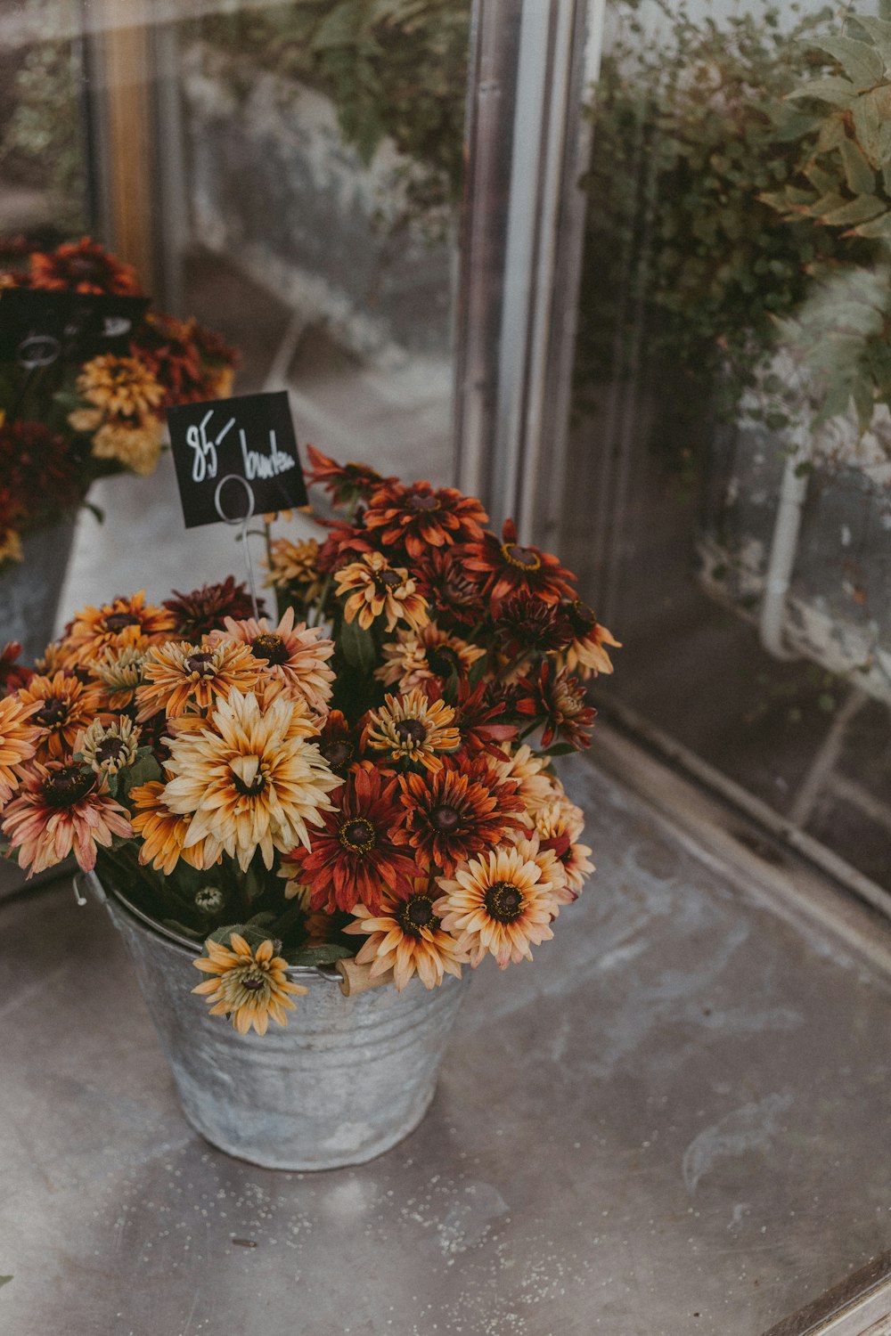 flowers in gray vase