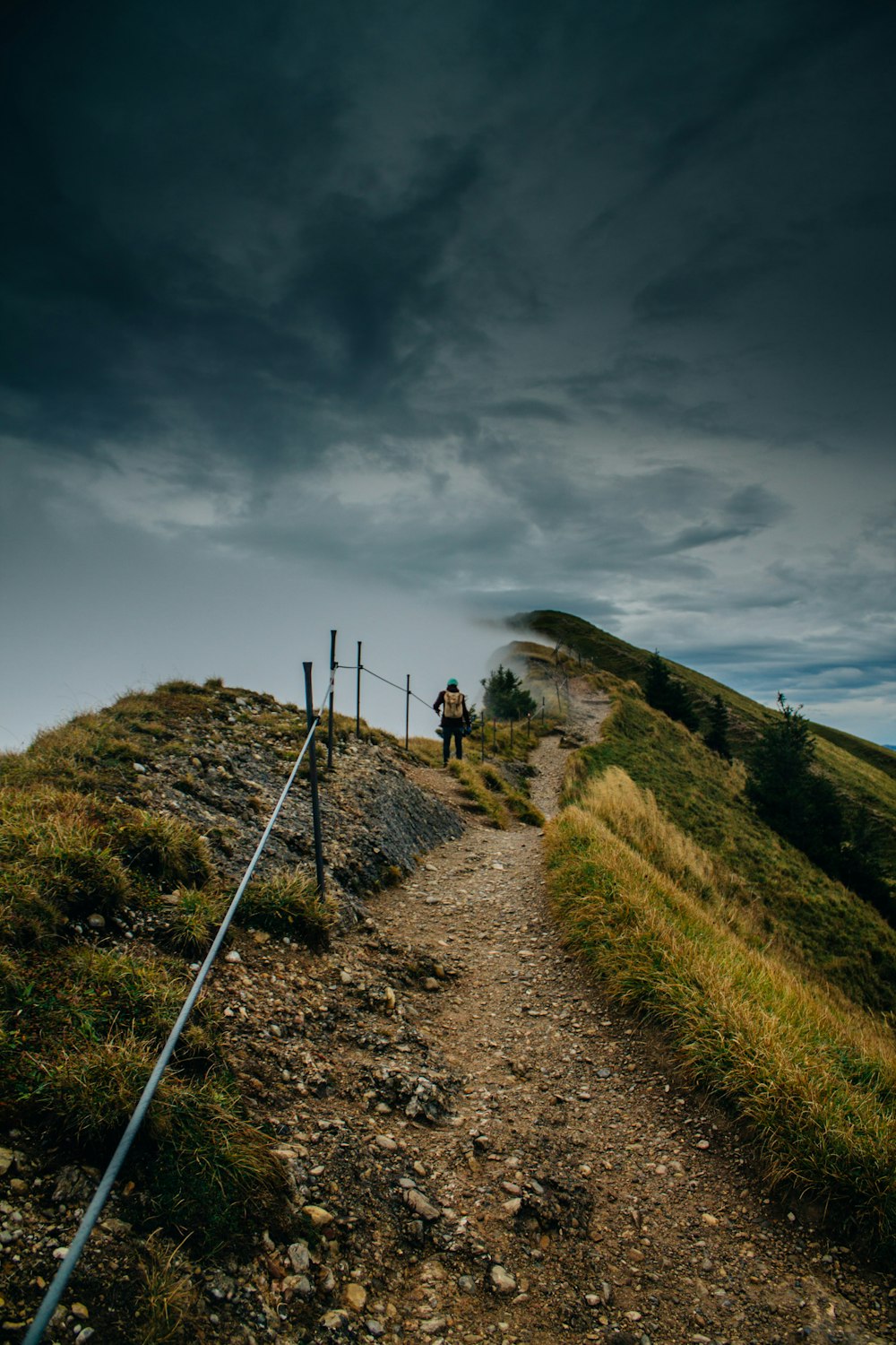 person on top of mountain