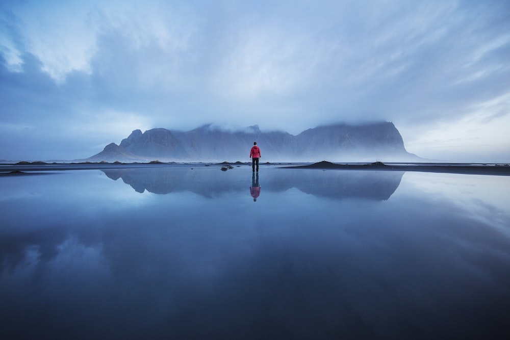 man standing on body of water