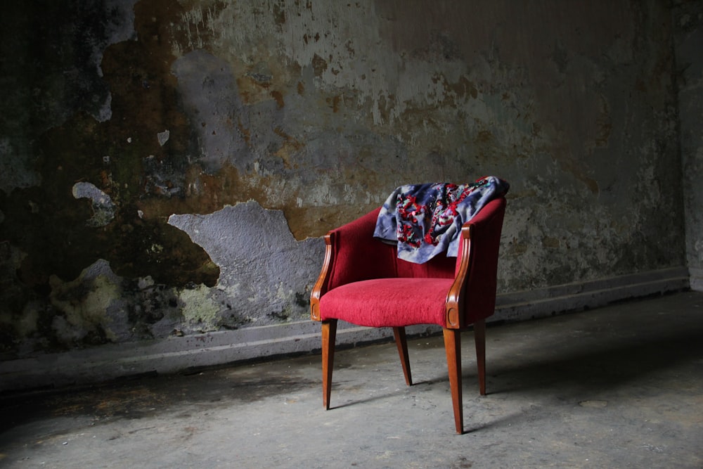 brown and red padded armchair