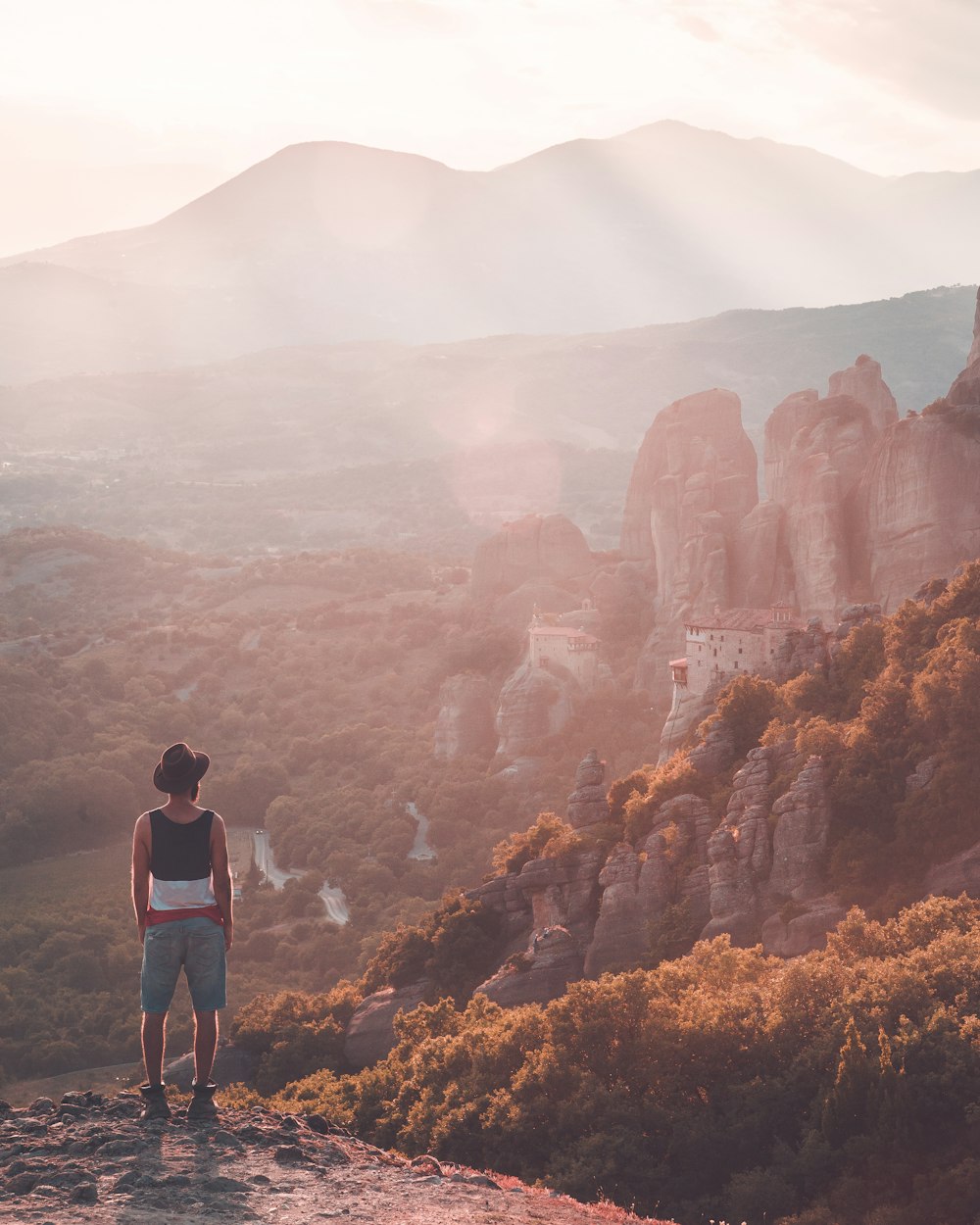 man standing near cliff