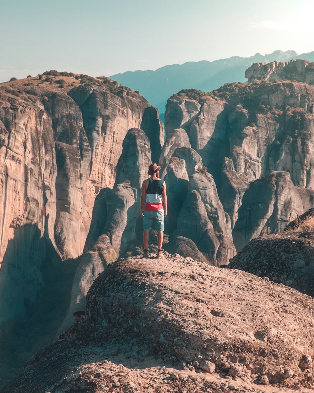 person standing on rock