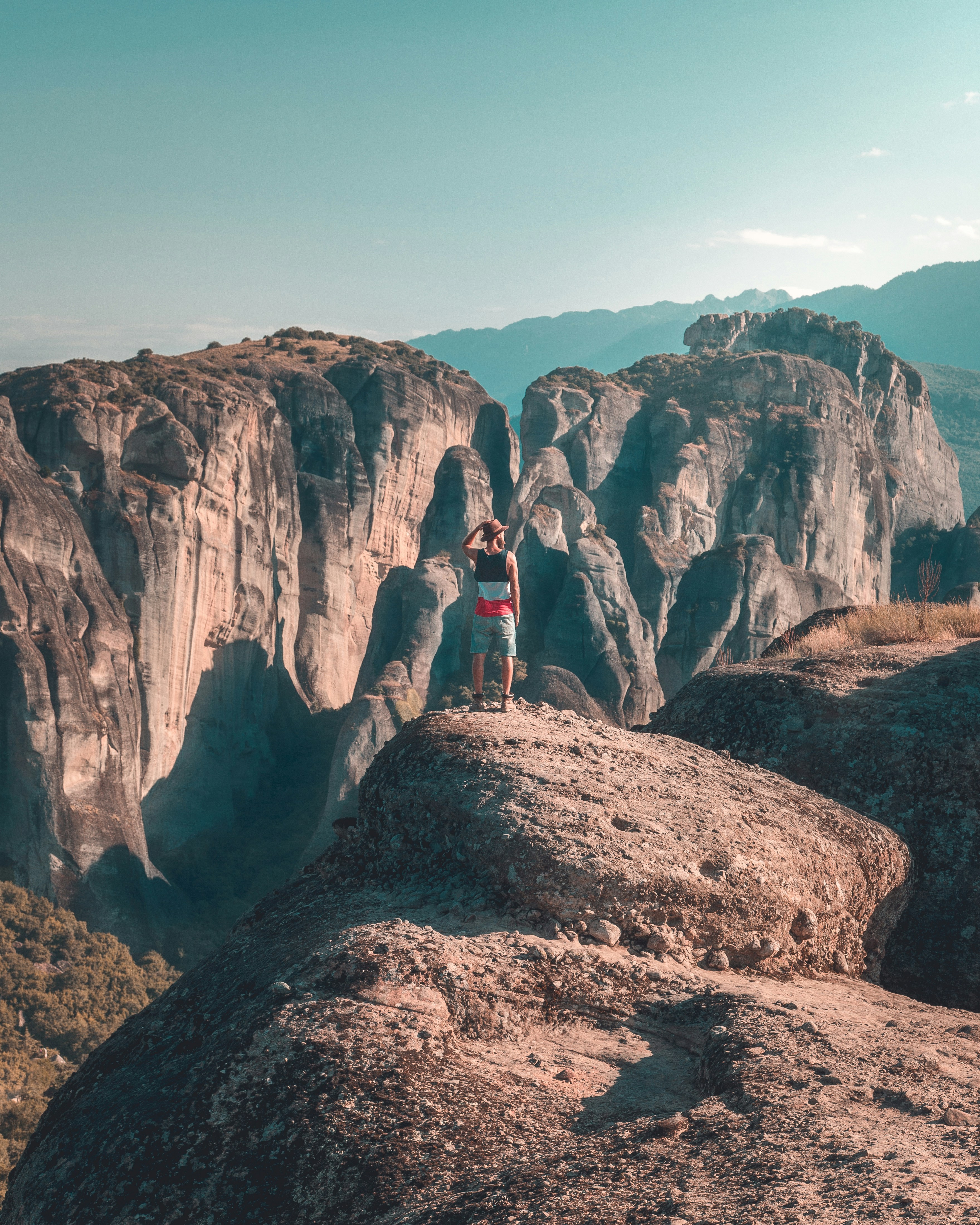 person standing on rock