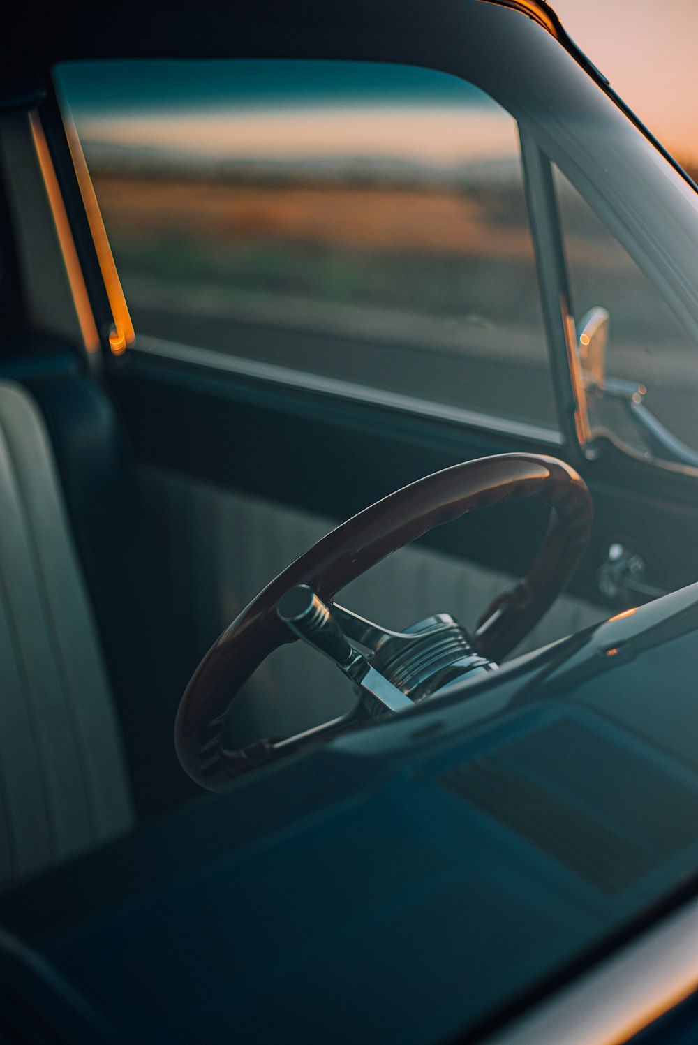 architectural photography of brown car steering wheel