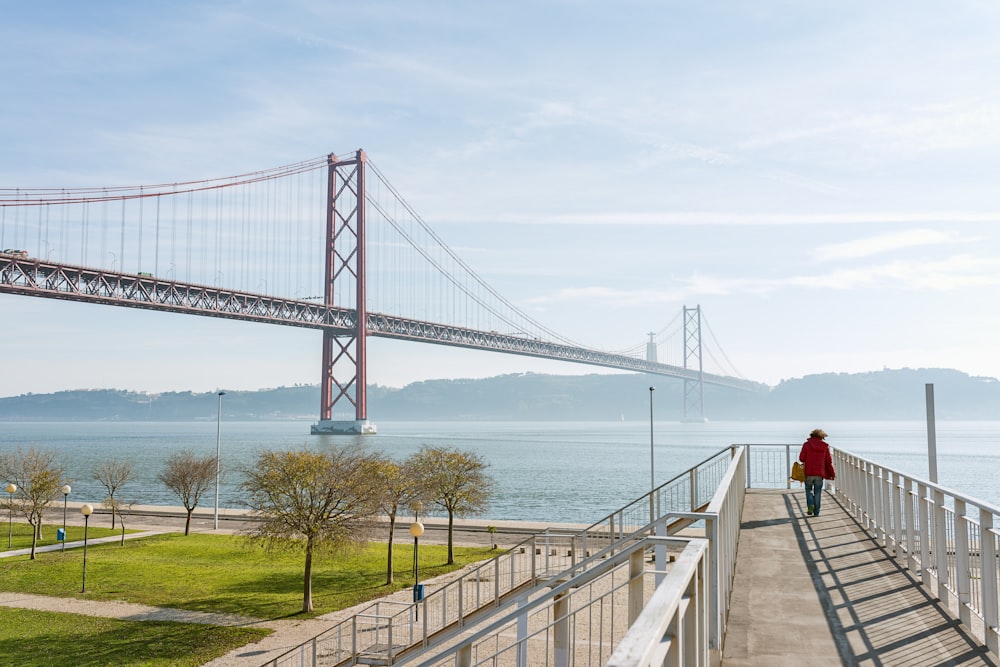 woman walking on bridge