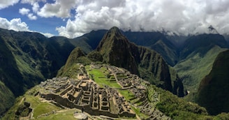 Incas civilization ruins on green mountain
