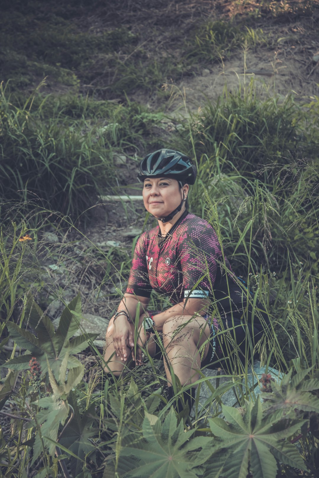 unknown person sitting outdoors