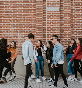 people standing near building