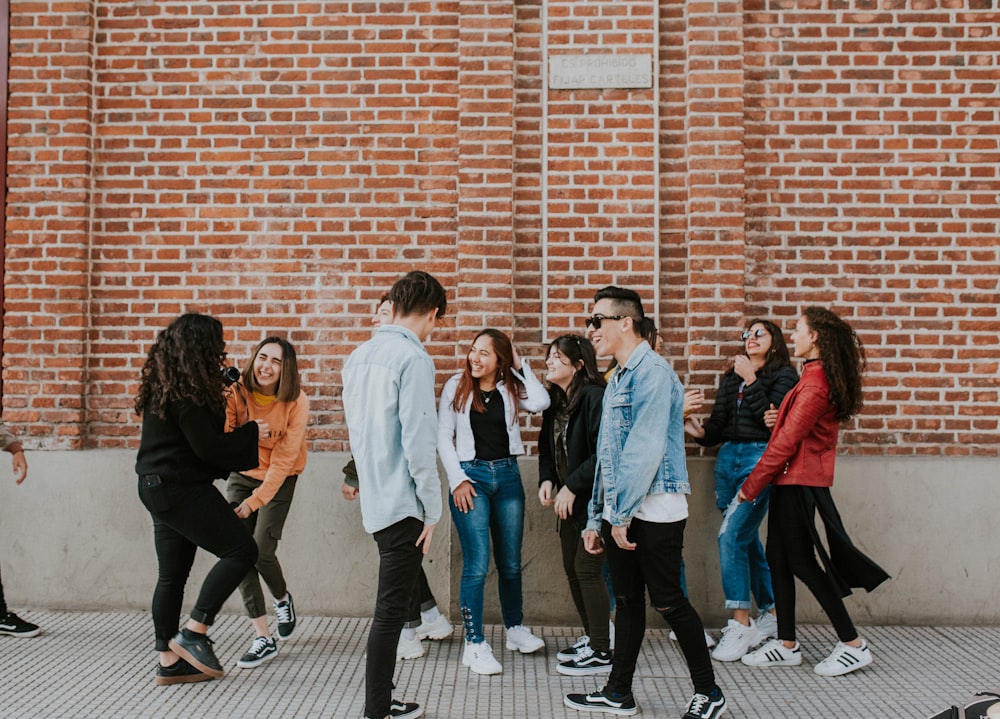 people standing near building