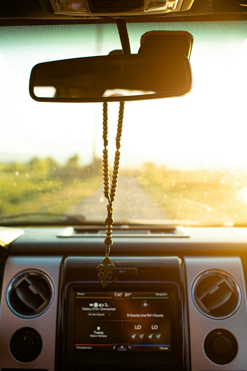 hanged beads on rear view mirror