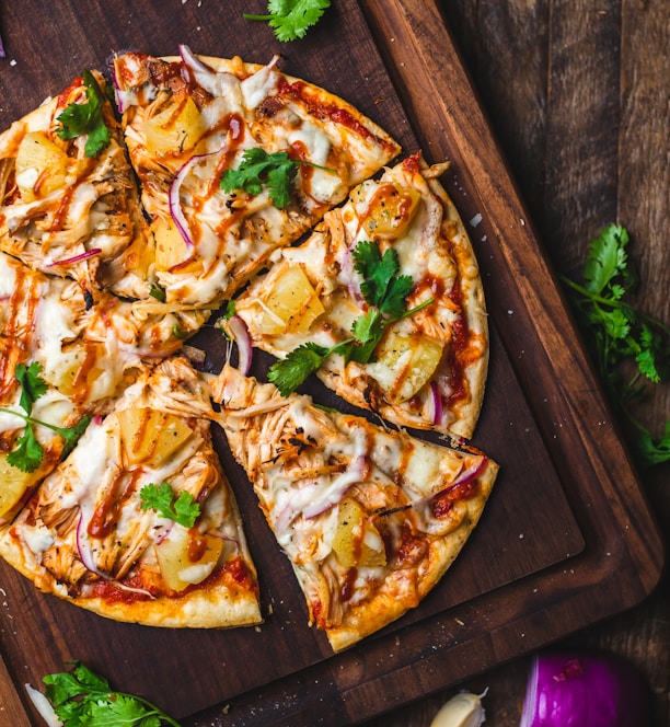 pizza on chopping board