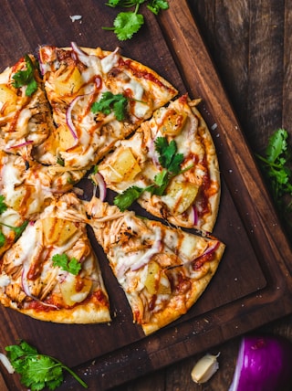 pizza on chopping board